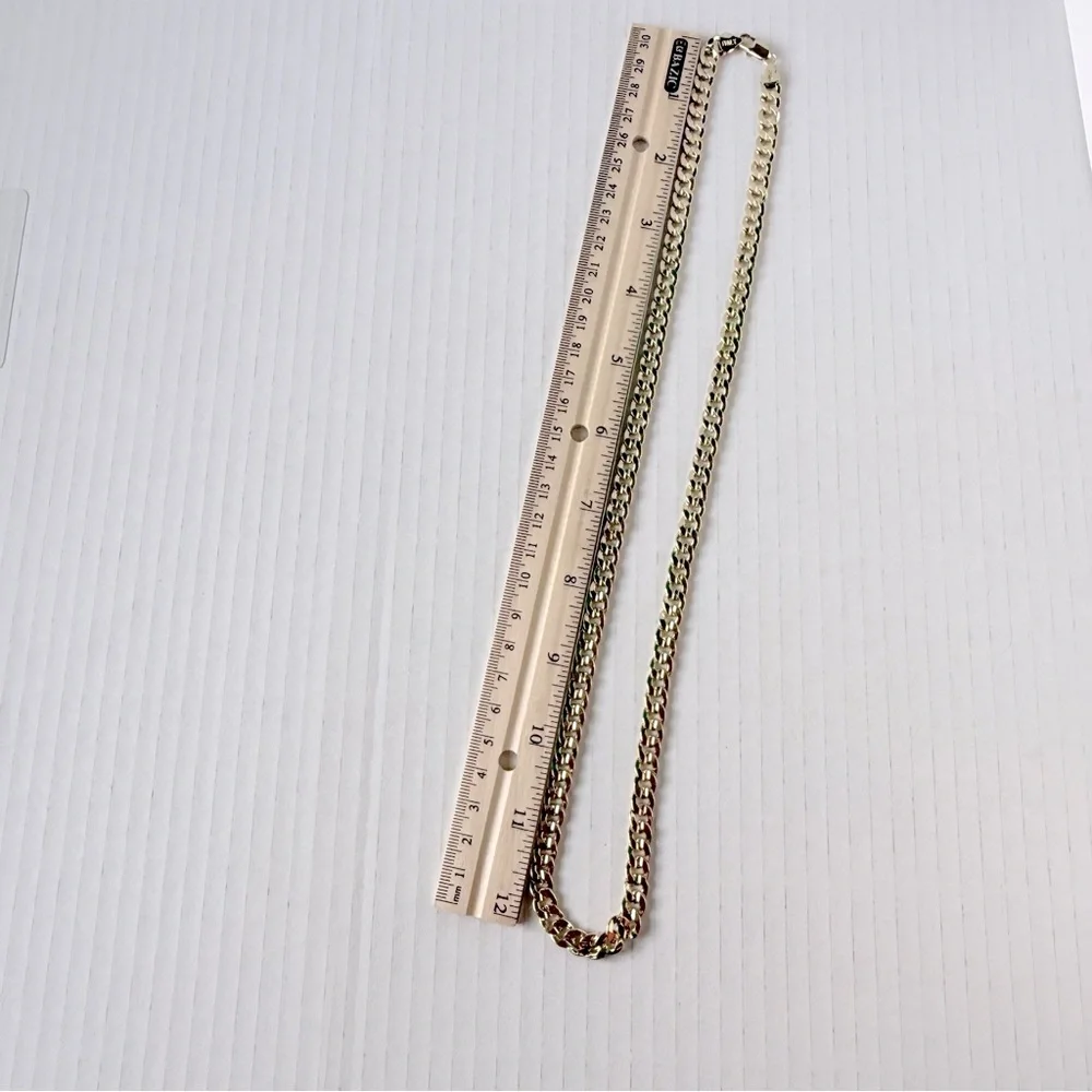 Chain‎ 24”of man with holy death medal. Laminated gold New
